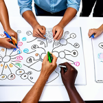**Image Prompt:** A diverse group of people from different cultures participating in a creative brainstorming session. Focus on bright, collaborative energy and the use of visual aids like whiteboards and colorful markers.